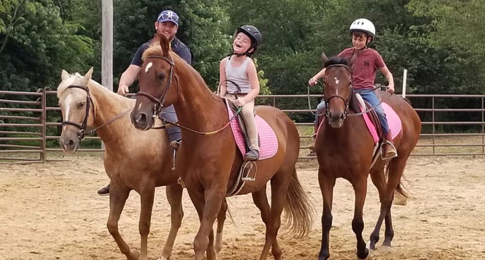 Raintree Equestrian Center logo